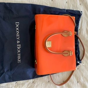 Dooney & Bourke patent leather tangerine 9x11 purse with dust bag